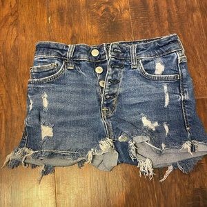 These Jean shorts are bluish color, they are size 0 in women’s